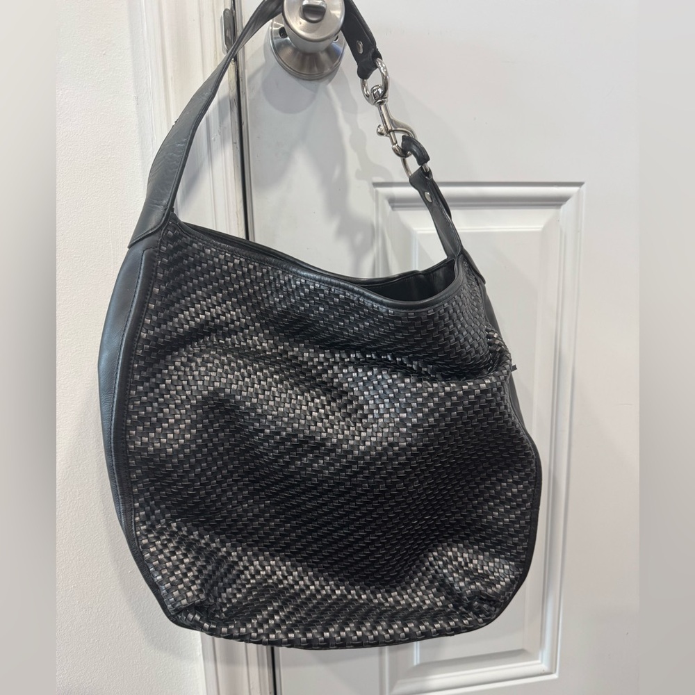 Coach basket weave leather bucket shoulder bag. Black and silver